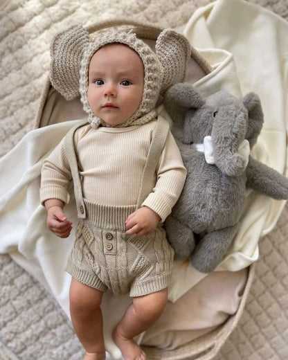 Baby cuddling Tembo heartbeat elephant — Baby Beats Australia