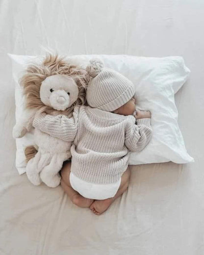Baby cuddling Rory heartbeat lion — Baby Beats Australia