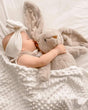 Baby cuddling Clover heartbeat bunny — Baby Beats Australia